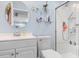 Well-lit bathroom featuring a shower, vanity, and stylish decor at 104 Clovis Circle, Myrtle Beach, SC 29579