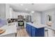 Modern kitchen with stainless steel appliances, kitchen island with seating and tiled backsplash at 104 Clovis Circle, Myrtle Beach, SC 29579