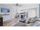 Open concept living area featuring a kitchen with a blue island and a comfortable sofa at 104 Clovis Circle, Myrtle Beach, SC 29579