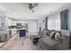 Open living area featuring a comfortable sofa and kitchen area at 104 Clovis Circle, Myrtle Beach, SC 29579