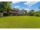 Expansive backyard featuring mature trees, a large lawn, and ample space for recreation and relaxation at 1140 Waterway Ln., Myrtle Beach, SC 29572