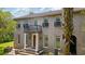 Beautiful exterior shot showcasing the brick facade, balcony, and manicured landscaping at 1140 Waterway Ln., Myrtle Beach, SC 29572