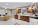 Bright kitchen with wooden cabinets, stainless appliances, and an adjacent dining area at 1140 Waterway Ln., Myrtle Beach, SC 29572