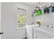Functional laundry room with modern appliances and storage at 1140 Waterway Ln., Myrtle Beach, SC 29572