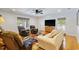 Spacious living room with hardwood floors, ceiling fan and comfortable seating for entertaining guests at 1140 Waterway Ln., Myrtle Beach, SC 29572