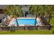 Backyard swimming pool framed by two palm trees at 1140 Waterway Ln., Myrtle Beach, SC 29572