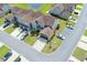 Aerial view of townhomes with mature landscaping, ponds and well-maintained streets at 115 Machrie Loop # D, Myrtle Beach, SC 29588
