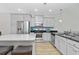 Well-equipped kitchen featuring stainless steel appliances, granite countertops, and a breakfast bar at 115 Machrie Loop # D, Myrtle Beach, SC 29588