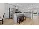 Modern kitchen featuring stainless steel appliances, granite countertops, and a center island with seating at 115 Machrie Loop # D, Myrtle Beach, SC 29588