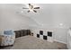 Spacious loft area with a ceiling fan, storage options, and comfortable seating at 115 Machrie Loop # D, Myrtle Beach, SC 29588
