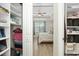 Well-organized walk-in closet with custom shelving and access to the light-filled bedroom at 115 Machrie Loop # D, Myrtle Beach, SC 29588