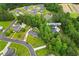 Aerial view of the property at 116 Chapel Ridge Cir nestled among trees with a backyard pool and patio at 116 Chapel Ridge Circle, Myrtle Beach, SC 29588