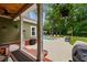 Backyard patio area with built-in grill, inground pool and views of lush landscaping at 116 Chapel Ridge Circle, Myrtle Beach, SC 29588