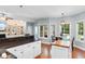 Bright kitchen features white cabinetry, dark countertops, and a butcher block island at 116 Chapel Ridge Circle, Myrtle Beach, SC 29588