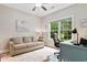 Serene home office featuring a comfortable sofa, desk, and natural light for a productive workspace at 116 Chapel Ridge Circle, Myrtle Beach, SC 29588