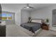 Inviting bedroom with neutral tones, a ceiling fan, and natural light from the window at 1168 Baker Creek Loop, Myrtle Beach, SC 29579