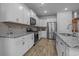 Well-equipped kitchen featuring stainless appliances, granite counters, and ample cabinet space at 1168 Baker Creek Loop, Myrtle Beach, SC 29579