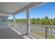 This lovely porch overlooks a green street with abundant landscaping at 1168 Baker Creek Loop, Myrtle Beach, SC 29579