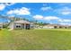 Wide shot of a verdant backyard space perfect for recreation and relaxation at 1170 Maxwell Dr., Little River, SC 29566