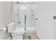 Clean bathroom featuring a walk-in shower with sliding glass door at 1170 Maxwell Dr., Little River, SC 29566
