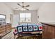Comfortable bedroom with ceiling fan and a pleasant view from the window at 1170 Maxwell Dr., Little River, SC 29566