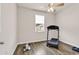 Bright bedroom featuring a ceiling fan and a treadmill for exercise at 1170 Maxwell Dr., Little River, SC 29566