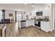 Modern kitchen with stainless steel appliances opens into the living room at 1170 Maxwell Dr., Little River, SC 29566