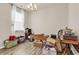 Multi-purpose room with hardwood-look flooring and bright natural light at 1170 Maxwell Dr., Little River, SC 29566
