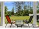 Enjoy the outdoors on the back patio with a view of the lush backyard and nearby green spaces at 120 Carolina Lakes Blvd., Myrtle Beach, SC 29588