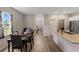 The dining area features a table with seating and a window that offers natural light and outdoor views at 120 Carolina Lakes Blvd., Myrtle Beach, SC 29588
