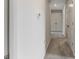Bright hallway featuring neutral paint colors, plush carpet, and multiple doors for convenient access at 120 Carolina Lakes Blvd., Myrtle Beach, SC 29588
