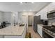 Modern kitchen featuring an island, stainless steel appliances, and ample cabinet space at 120 Carolina Lakes Blvd., Myrtle Beach, SC 29588