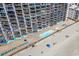 High-rise beachfront condo featuring a pool, beach access, and multiple balconies at 1210 N Waccamaw Dr. # 1105, Murrells Inlet, SC 29576