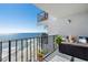 Spacious oceanfront balcony with lounge seating and scenic views of the beach at 1210 N Waccamaw Dr. # 1105, Murrells Inlet, SC 29576
