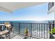 Inviting oceanfront balcony with comfortable seating, offering breathtaking views at 1210 N Waccamaw Dr. # 1105, Murrells Inlet, SC 29576