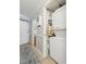 Hallway leading to in-unit laundry area at 1210 N Waccamaw Dr. # 1105, Murrells Inlet, SC 29576