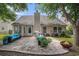Backyard patio featuring outdoor seating, a fire pit, and a well-maintained lawn for relaxing outdoors at 140 Avondale Dr., Myrtle Beach, SC 29588