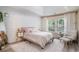 Cozy bedroom showcases vaulted ceilings, natural light and shiplap accent wall at 140 Avondale Dr., Myrtle Beach, SC 29588