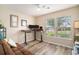 Bright home office with multiple windows, a ceiling fan and modern flooring at 140 Avondale Dr., Myrtle Beach, SC 29588