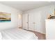 Neutral bedroom featuring plush carpet, closet, and calm artwork at 1403 Nokota Dr., Conway, SC 29526