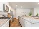 Contemporary kitchen with stainless steel appliances, granite countertops, and a convenient center island at 1403 Nokota Dr., Conway, SC 29526