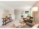 Cozy sitting room featuring modern decor, plush chairs, and natural light at 1403 Nokota Dr., Conway, SC 29526