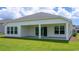 Covered patio overlooking a lush, green backyard at 141 Stride Ct., Myrtle Beach, SC 29588