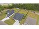 Aerial view of the home and surrounding community showing the pond, shed, and gazebo at 1476 Burriss Rd., Conway, SC 29526
