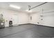Spacious garage with painted floors, door to the home, and storage at 1476 Burriss Rd., Conway, SC 29526