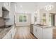 Open concept kitchen with stainless steel appliances, granite counters and island at 1476 Burriss Rd., Conway, SC 29526