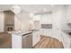Modern kitchen with stainless steel appliances, an island, and a brick fireplace at 1476 Burriss Rd., Conway, SC 29526