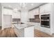 Modern kitchen with stainless steel appliances, kitchen island, and white cabinets at 1476 Burriss Rd., Conway, SC 29526
