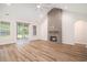Bright living room features vaulted ceiling, hardwood floors, and access to the backyard at 1476 Burriss Rd., Conway, SC 29526