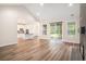 Bright living room features hardwood floors, fireplace, and large sliding doors to the backyard at 1476 Burriss Rd., Conway, SC 29526